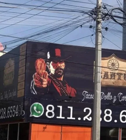 Главный герой Red Dead Redemption появился на рекламном баннере ресторана